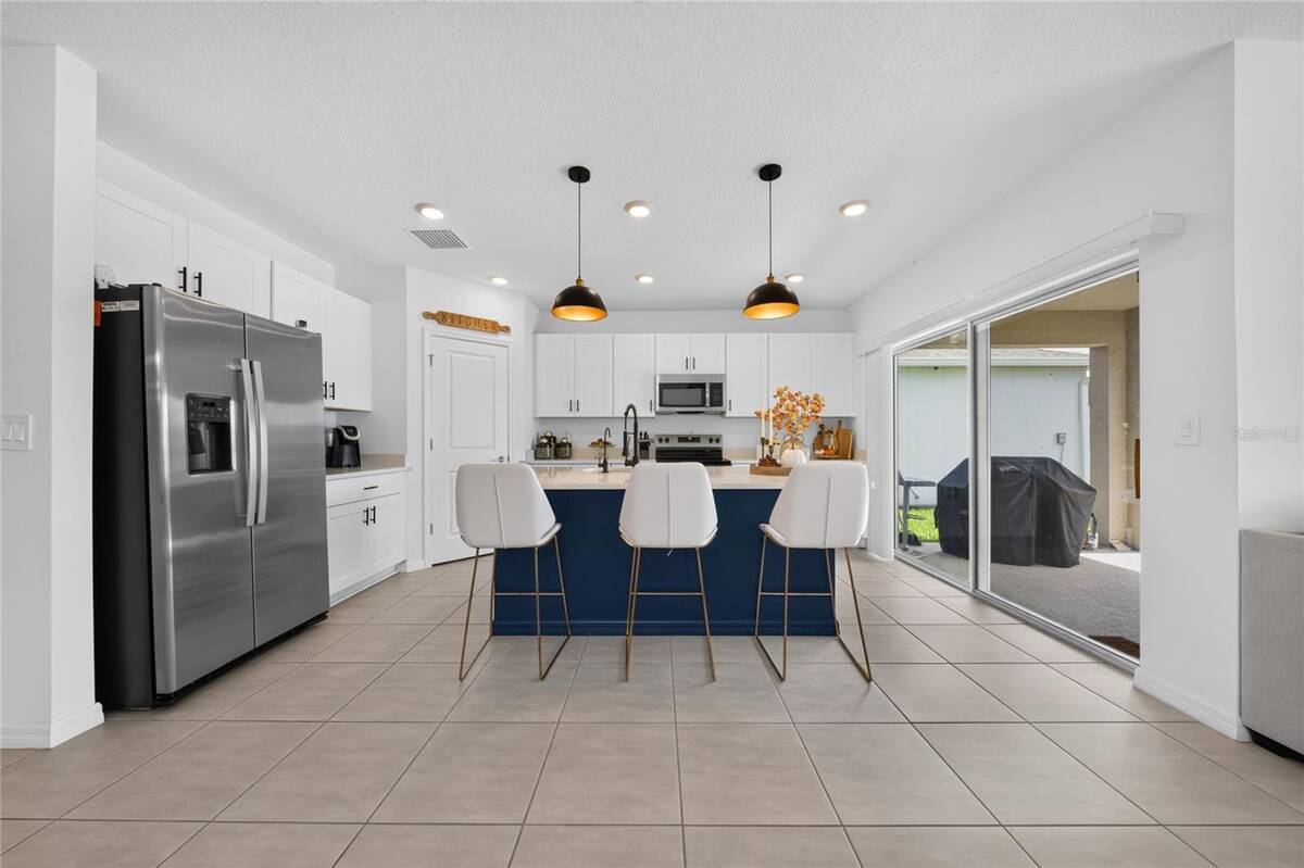 3058 Cadence Sound Lane, Kissimmee, FL 34744