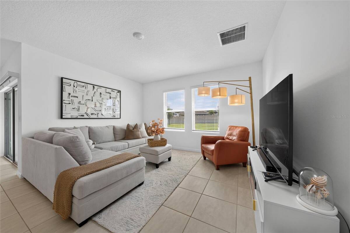 3058 Cadence Sound Lane, Kissimmee, FL 34744