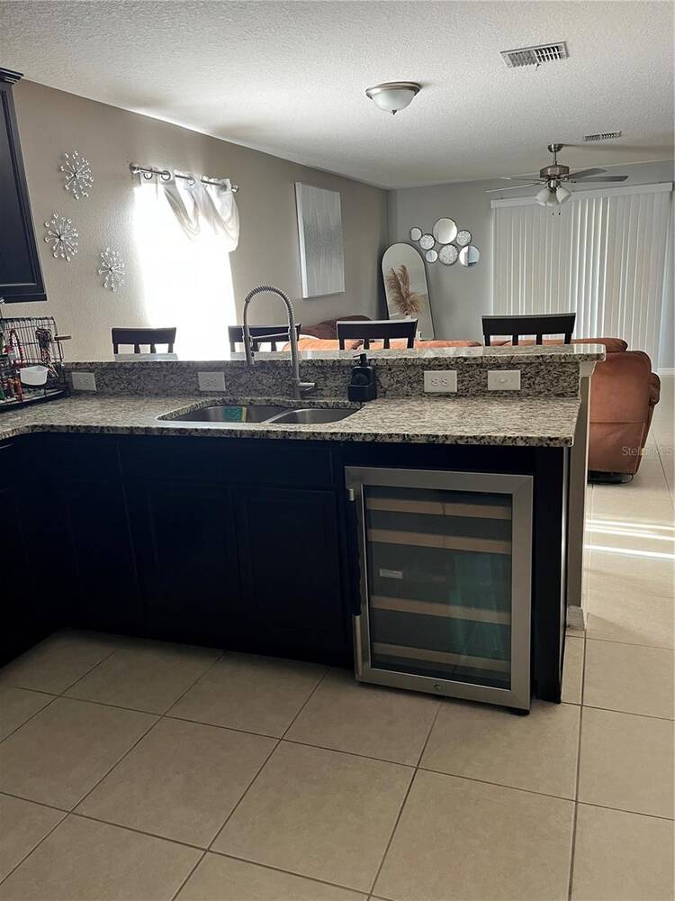 2121 Hibiscus Place, Poinciana, FL 34759