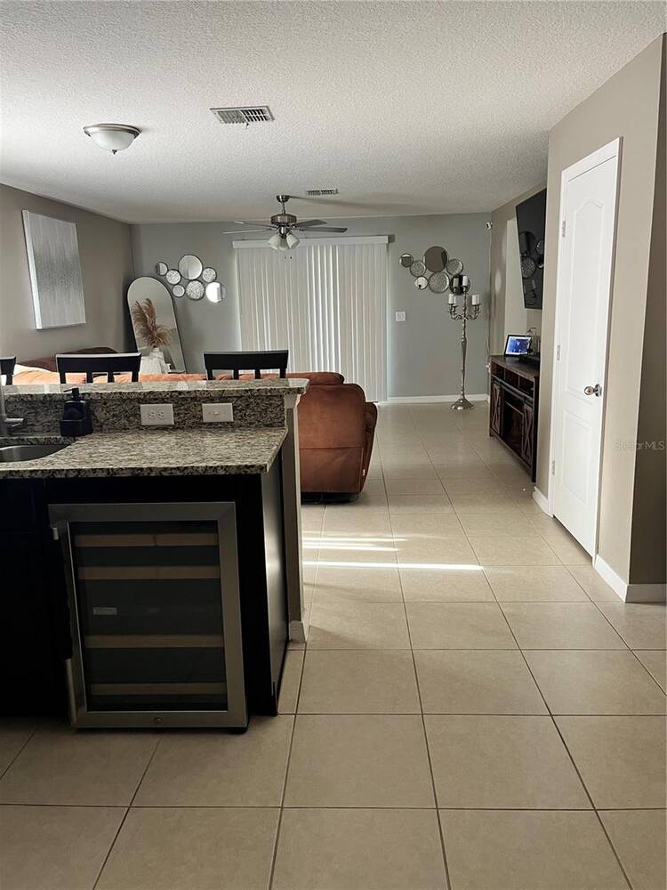 2121 Hibiscus Place, Poinciana, FL 34759