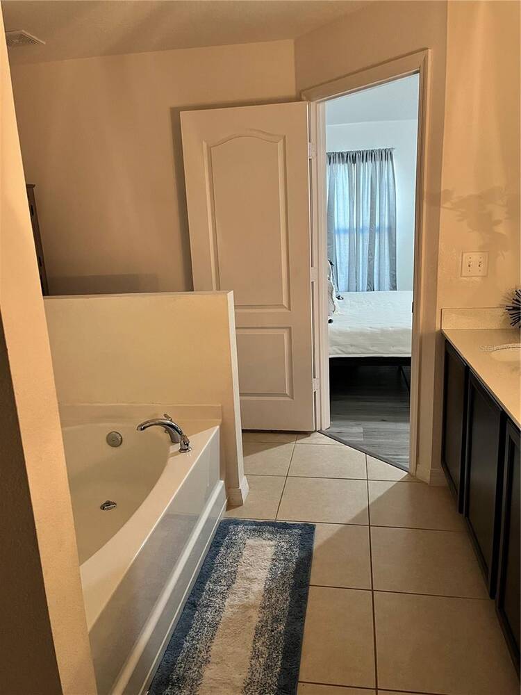 2121 Hibiscus Place, Poinciana, FL 34759