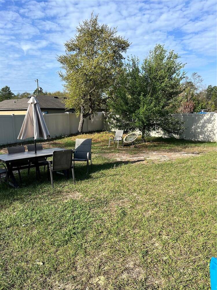 2121 Hibiscus Place, Poinciana, FL 34759