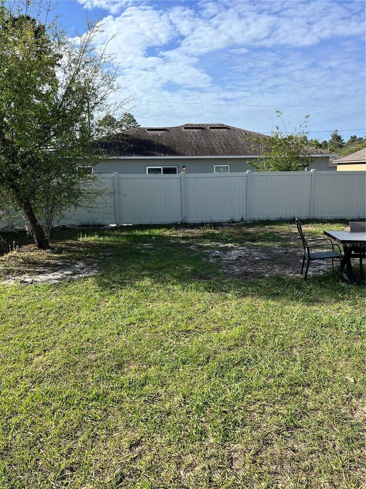 2121 Hibiscus Place, Poinciana, FL 34759