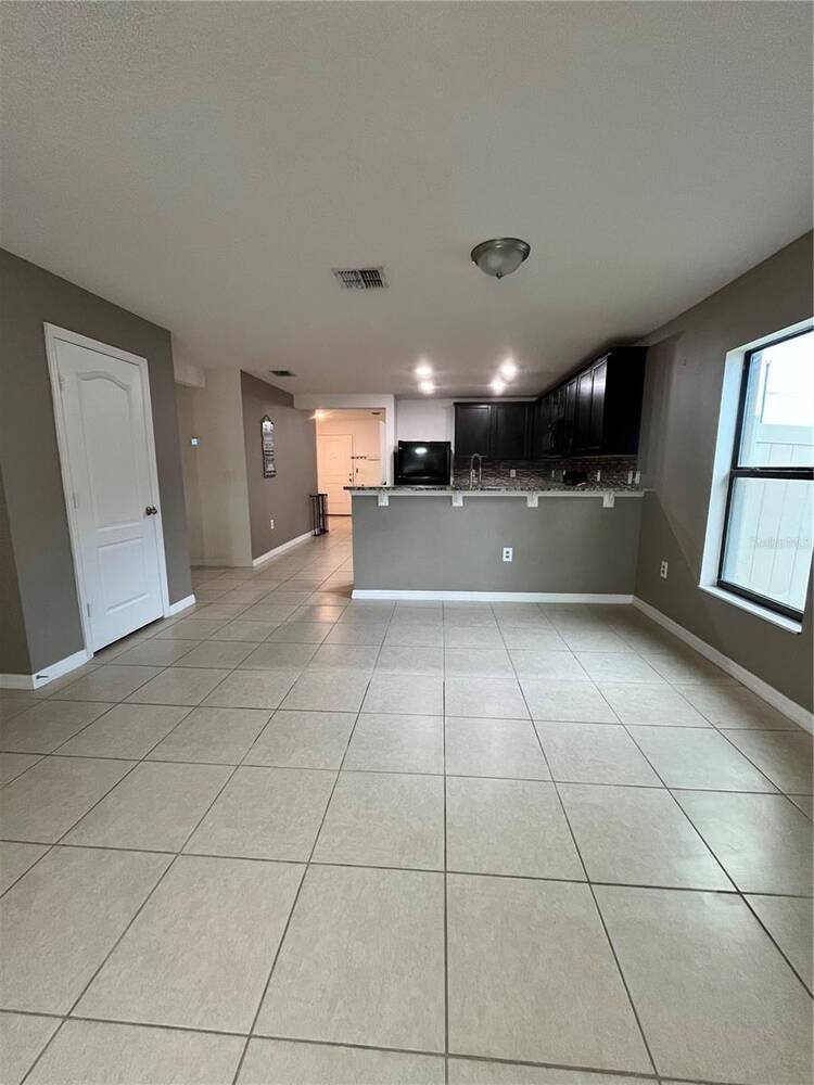 2121 Hibiscus Place, Poinciana, FL 34759
